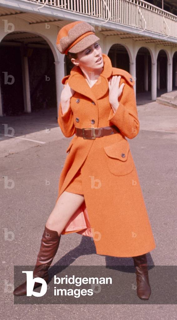 Orange maxi coat in hand woven tweed with matching hat designed by Jimmy Hourihan, March 1968 (photo)