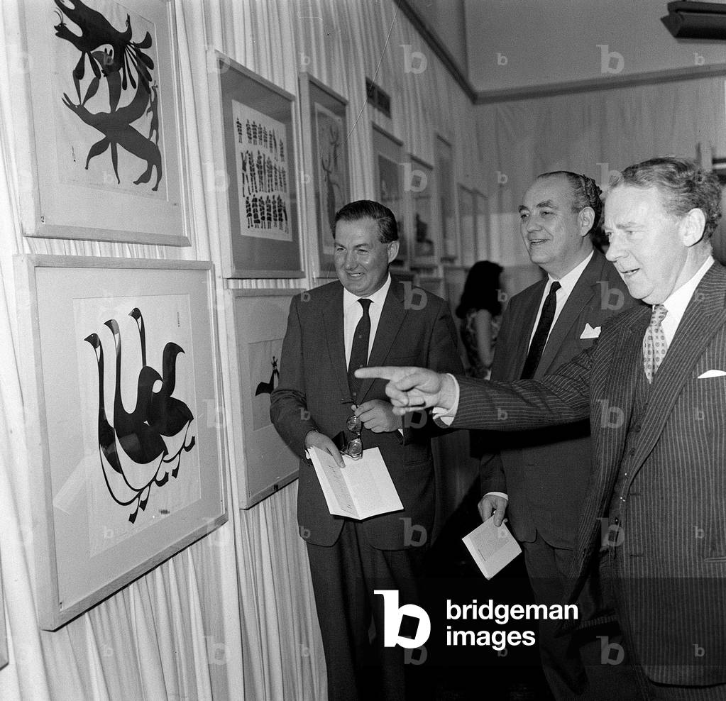 Festival of Labour Exhibition Hugh Gaitskell and James Callaghan admiring some of the artwork at the Festival of Labour exhibition, 1962 (b/w photo)