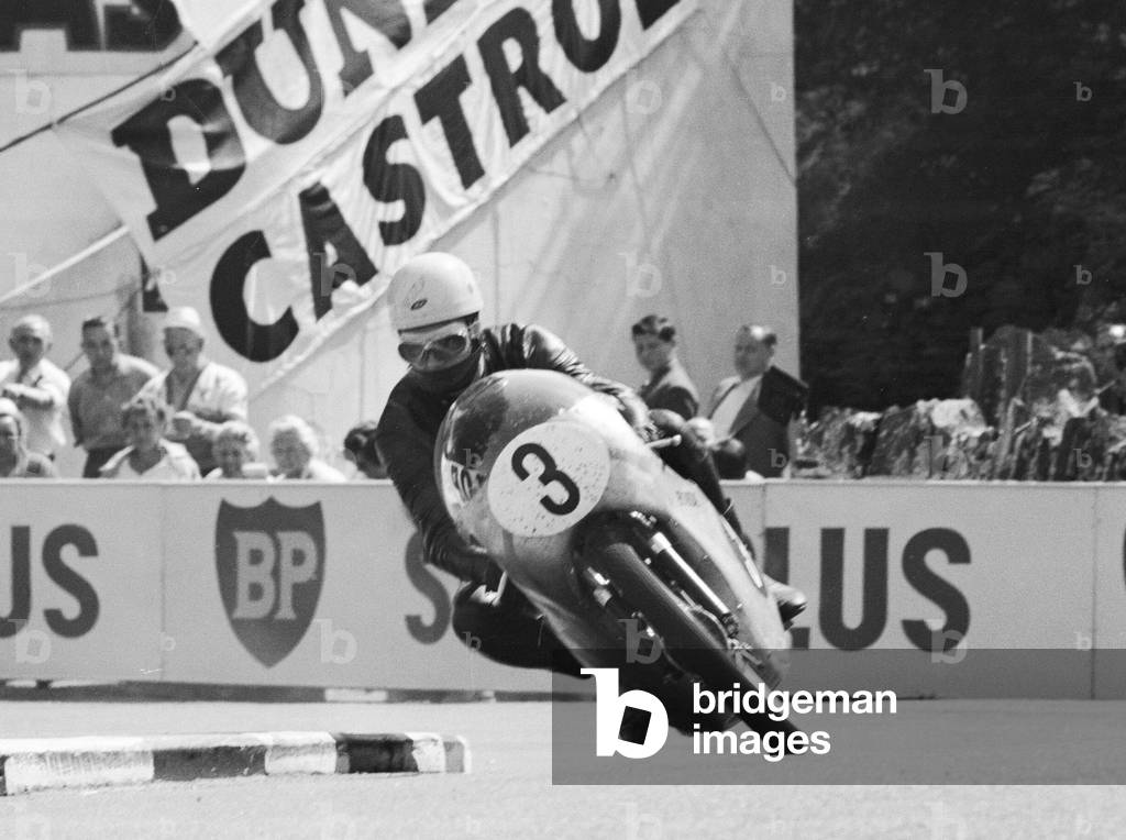 Lightweight 125cc race, Isle of Man. Jim Redman in action. 4th June 1964 (b/w photo)
