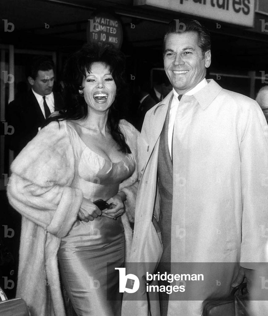 Laya Raki Actress and husband Ron Randell at London Airport, May 1965 (b/w photo)