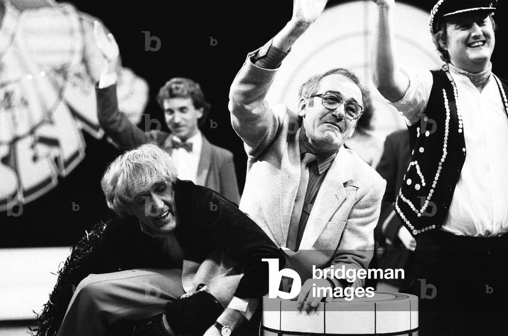 Rod Hulll and Emu seen here with Jim Bowen during a cheque presentation to the NSPCC during the record of Bullseye. 28th October 1984 (b/w photo)