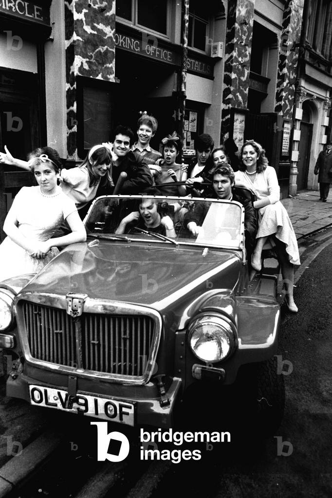 Newcastle University students on a photo call outside the New Tyne Theatre, Westgate Road, Newcastle on 29th February 1984 (b/w photo)
