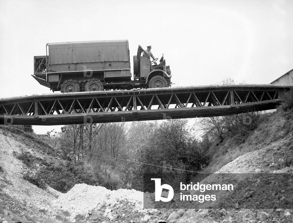 British army soldiers crossing over a bailey bridge in a truck during training exercises in England
 Circa 1940