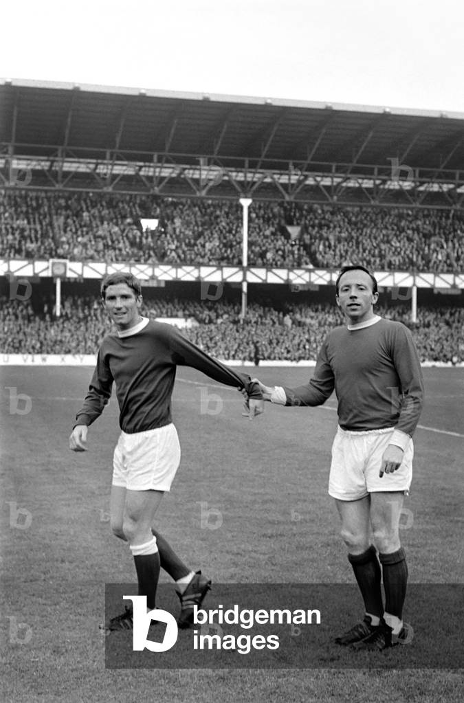 Nobby Stiles in action during the match between Manchester United and Everton: Nobby stiles and Alan Ball seen here during the Manchester United v. Everton game. October 1966 W9190b-003 (photo)