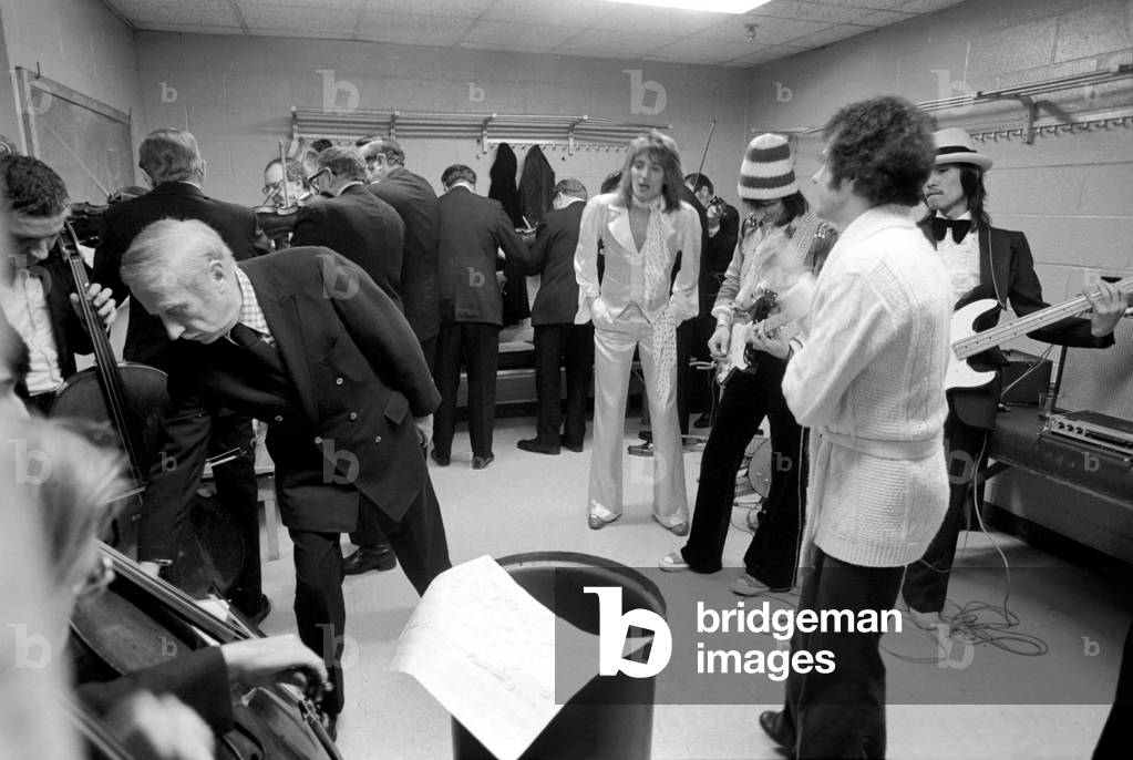 Rod Stewart and The Faces tour of America. 
The band in the dressing room before a gig, April 1975