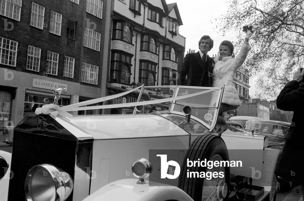 Actess and top model Vicki Hodge today married Ian Heath ,who is in advertising, at Chelsea Register Office. The bride wore a white mini dress and coat, and the couple drove off after the ceremony to a small lunch reception in a white 1923 Rolls Royce. The couple, Vicki and Ian pictured in the 1923 white Rolls Royce after the ceremony. December 1969