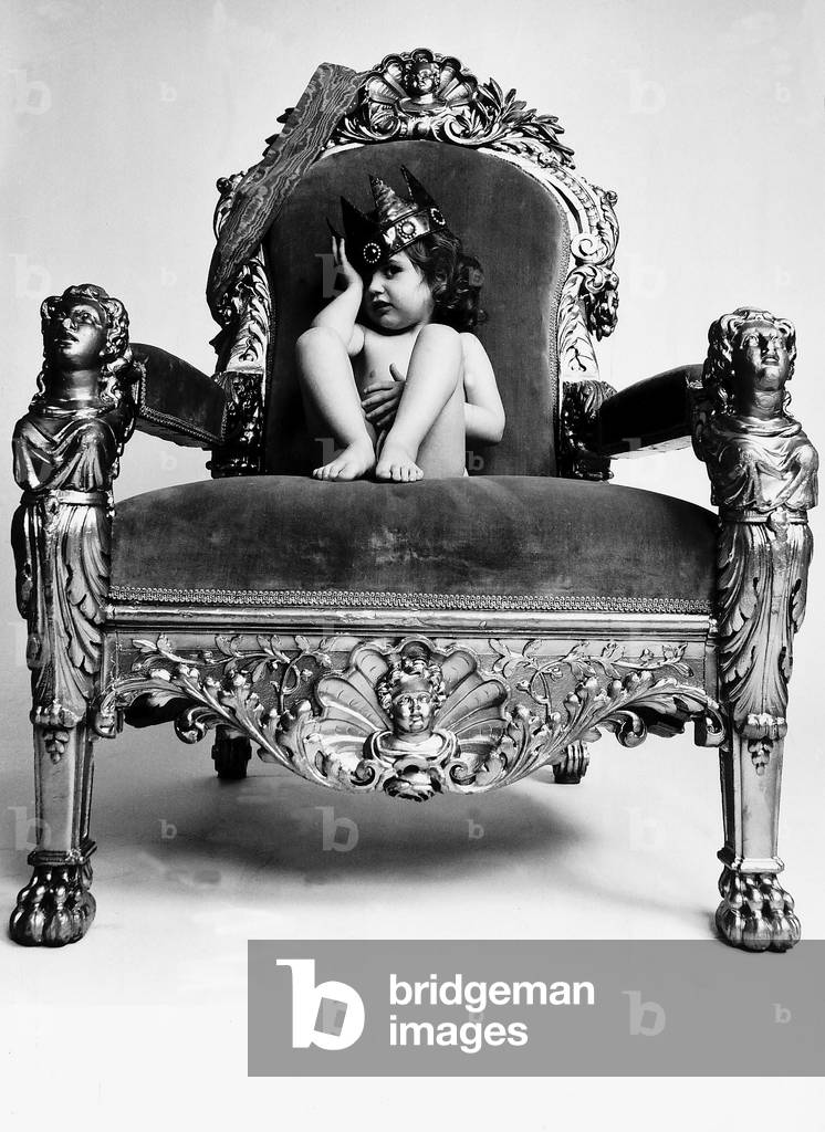Tamsina from Ilford, Essex sitting on chair during the Mini Miss world competition, 1972