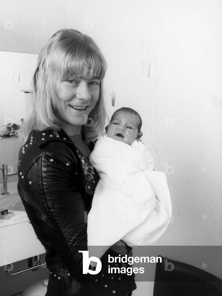 Brian Connolly, lead singer of that chart-busting group The Sweet, is a family man now. And the new pop is clearly proud to present his first-child, Nicola. Brian's 23 year old wife Marilyn gave birth to their 7lb daughter in hospital at Chertsey, Surrey on 3-4-1974. The 24 year old star whose song successes include 