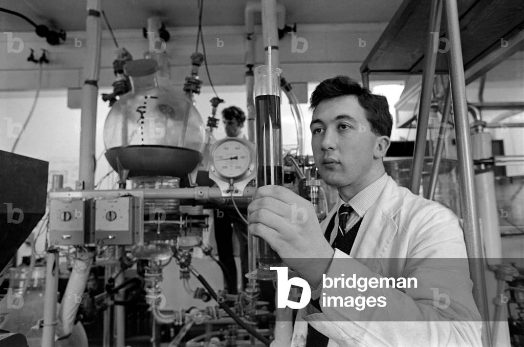 The Bio-Chemistry Department at Birmingham University houses a very unusual school - The British School of Malting and Brewing. 
Albert Wadeson, a technical assistant at Birmingham University's Department of Bio-Chemistry takes a specific gravity reading from beer brewed by students; in the background is the school's miniature brewery. 
December 1969