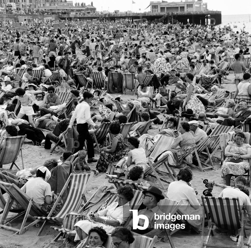 Hot weather scenes on the beach in Margate, Kent, during August Bank Holiday. 5th August 1962 (b/w photo)