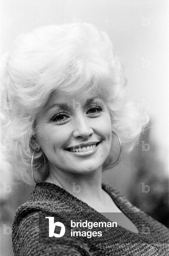 Country & Western singer Dolly Parton pictured in Los Angeles. 10th March 1980 (b/w photo)