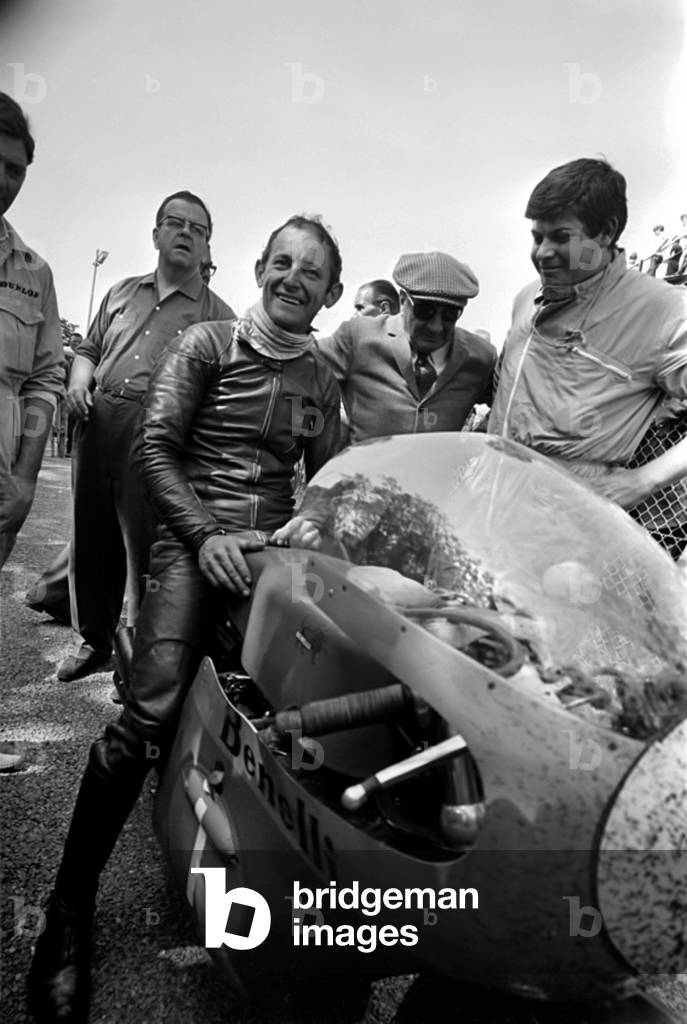 Sport Motorcycling: Isle of man TT Racing Production 250CC Class. Kel Carruthers celebrates victory on his Benelli Bike. June 1969
