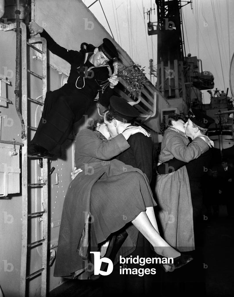 HMS Battleaxe, a battle class destroyer returns home to a warm welcome, Devonport, Devon, 12th December 1955 (b/w photo)