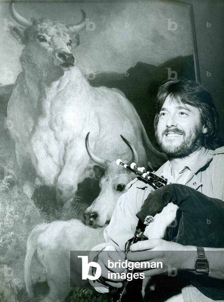 Northumbrian piper Dave Bailey, from Westerhope gets in a little practice for the Northumbrian Pipers Society Competition at the Laing Art Gallery in Newcastle in October 1983 08/10/1983 (b/w photo)