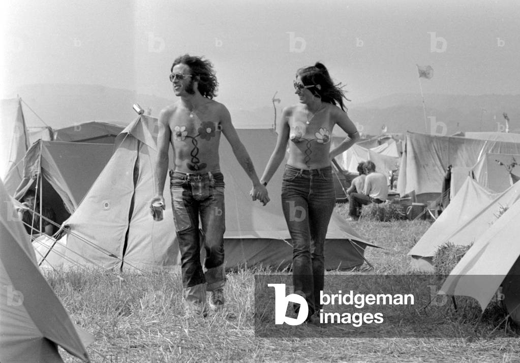 Hippy couple with their chests painted at the Isle of Wight Pop festival.
27th August 1970