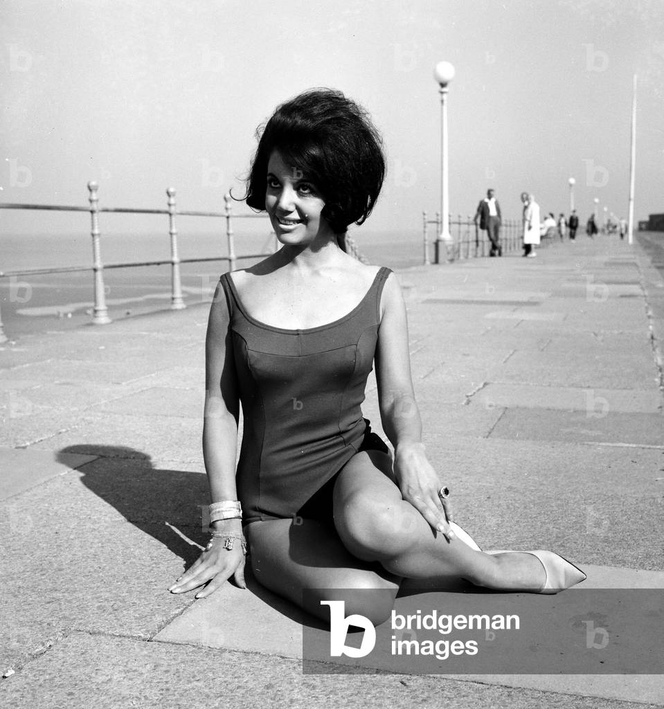 Miss UK finalist 1964, Luisa Debaisa Gibbins, pictured on Blackpool's Golden Mile. 2nd September 1964 (b/w photo)