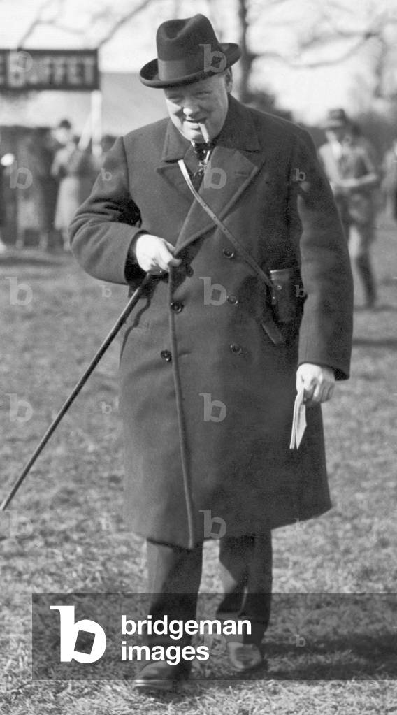 Prime Minister Winston Churchill pictured attending the Grand National ast Aintree, Liverpool.
April 1931.