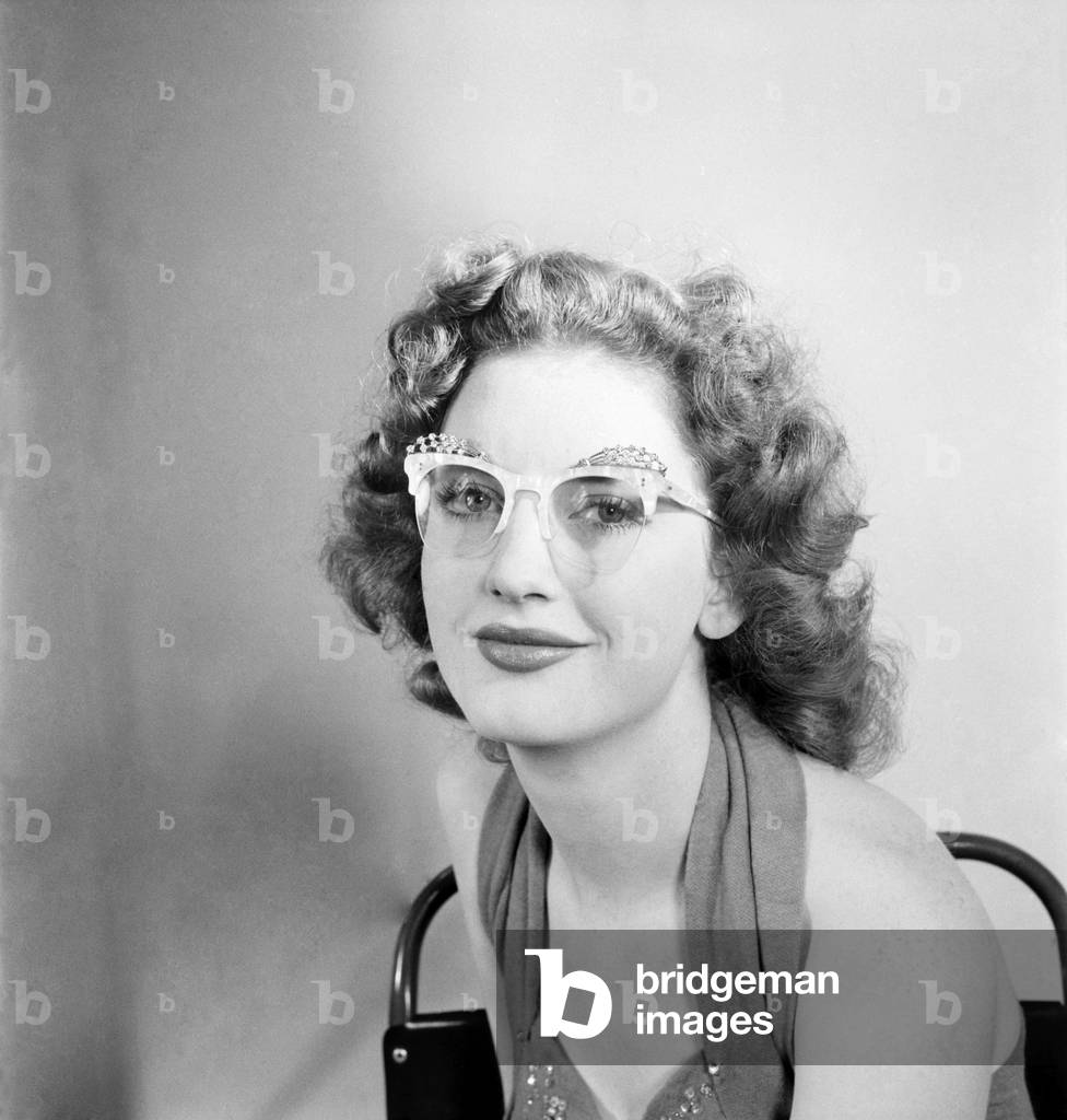 19 Yrs old actress Shirley Lorimer displaying the spectacles. May 1953 D2541-002