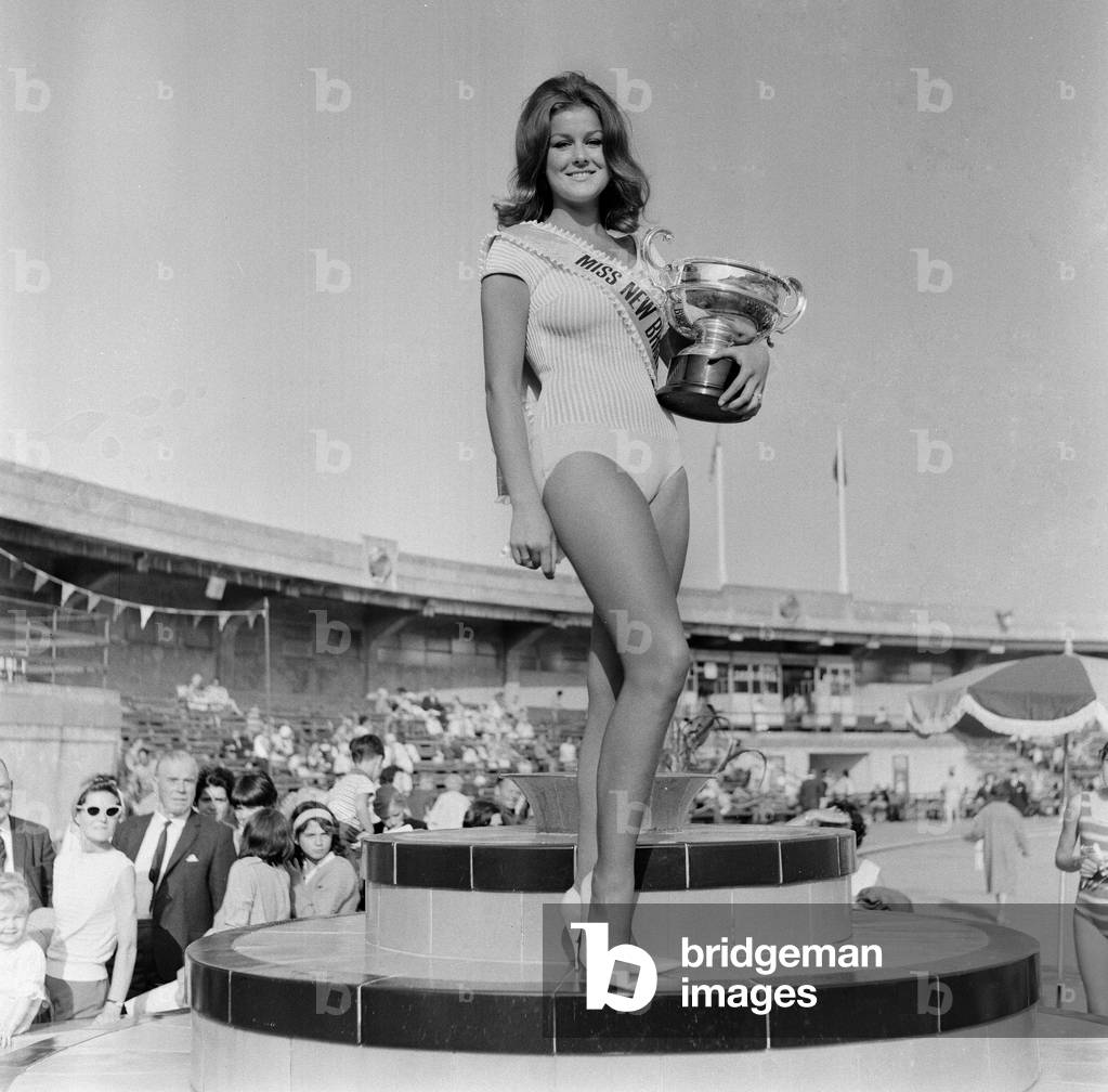 Carole Fletcher, 19 from Southport, crowned Miss New Brighton, New Brighton swimming baths, Cheshire, 24th August 1966 (b/w photo)