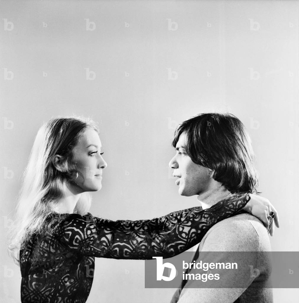 Love and Romance: A couple hugging and kissing. December 1969