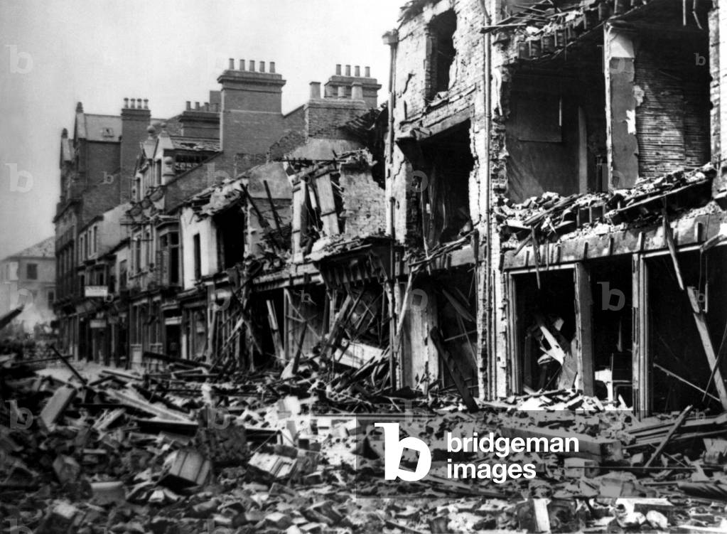 Second World War - The ruins after a German air raid on a North East of England town. Middlesbrough's Wilson Street pictured after a raid in August, 1942 (b/w photo)