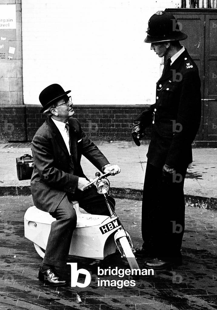 Motor Cycles Misc John Connell of the noise abatement society on a new silent motorbike with policeman, c. 1970s (b/w photo)