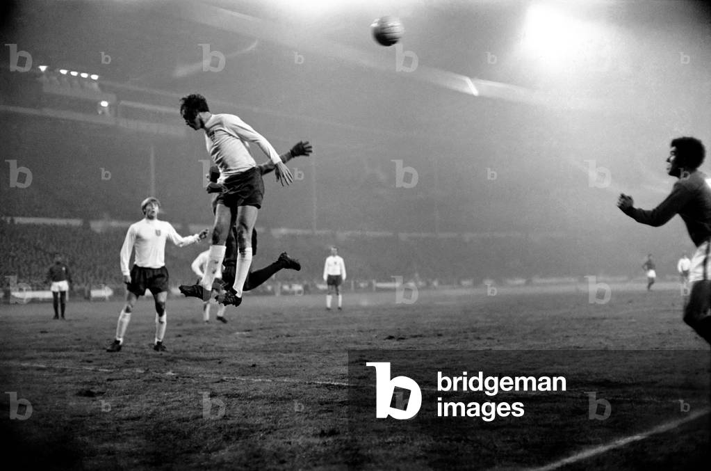 England's v. Portugal. Penalty! French referee Mouton wards off angry Portugese protests. January 1970 (photo)