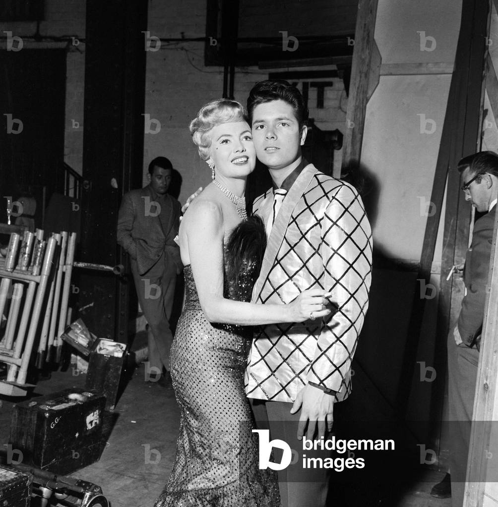 Cliff Richard with his co-star Yolande Donlan on the set of the film Expresso Bongo. 27th July 1959.
