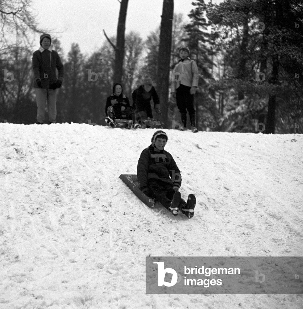 Children sledging at The Grove, Kenilworth Road, Coventry, 3rd January 1963 (b/w photo)