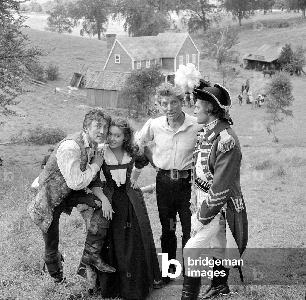 Burt Lancaster playing cards with his actor colleagues during the filming of The Devils Disciple. July 1958 (b/w photo)