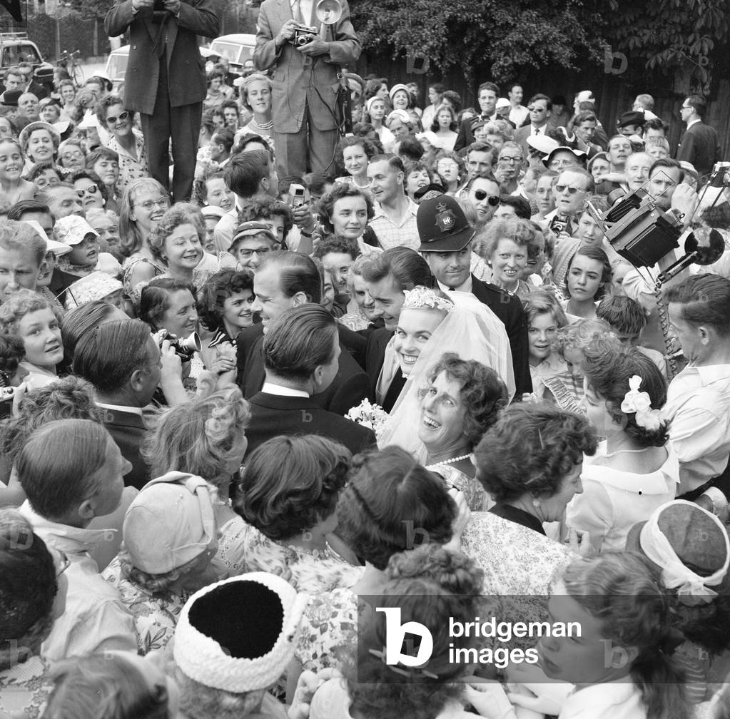 Shirley Eaton, TV and Film Actress aged 21, wedding to Colin Lenton Rowe aged 27, St Mary's, Kenton, Middlesex, Monday 5th August 1957 (b/w photo)