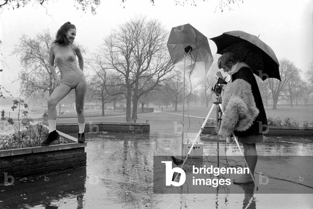 Swimming costume. Model Marion Proffitt wearing a Turquoise Lycra one-piece swimsuit cut low at the sides, by Trend. This suit will be in the shops in the new year (1970) and will retail for approx. 145 shillings. November 1969