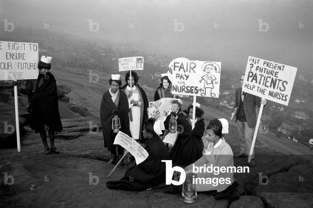 Nurses campaigned for more pay near Ilkley when they marched from the town centre to the Cow & Calf Rocks high on the Ilkley moors where they intend to camp. Pictures show the nurses on their way to the Cow and Calf Rocks
December 1969
