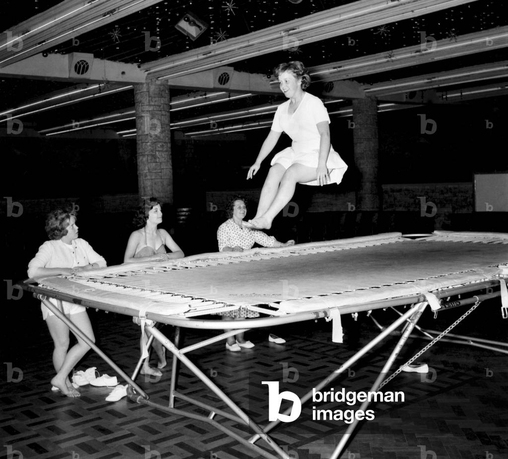 Bultins Holiday Pwllheli: Mrs. Nellie McGrail, Pools Winner. Horse riding/Boating/Elephant/Roller skating/Family. Now a ride the big wheel for Mrs. McGrail and Barbara. Trampolining. June 1960