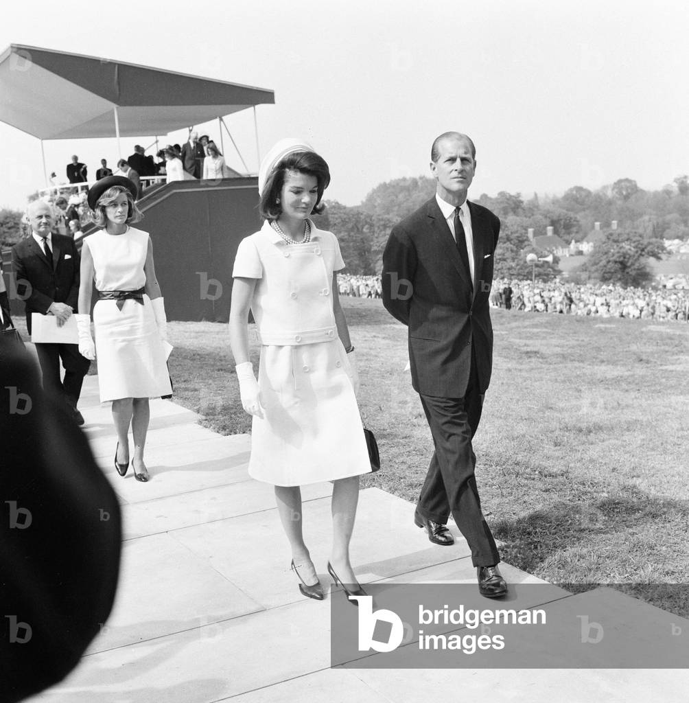 Jackie Kennedy, wife of assassinated American President John F. Kennedy, pictured with Prince Philip at Runnymede for The Kennedy Memorial Stone ceremony., May 1965 (b/w photo)