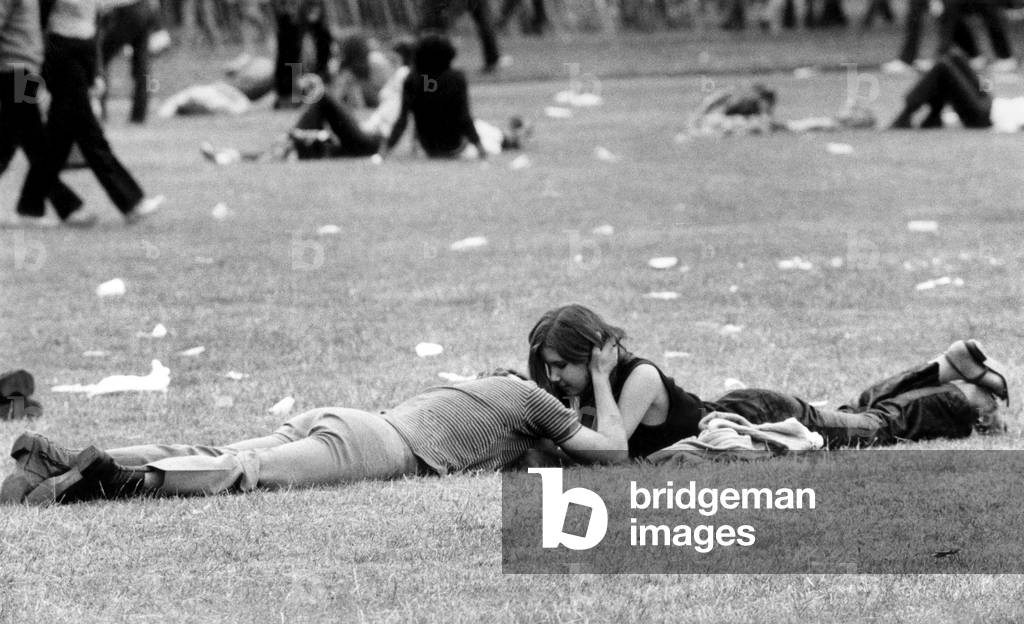 A couple enjoying the open air and the music as well as each other's company. 
July 1970