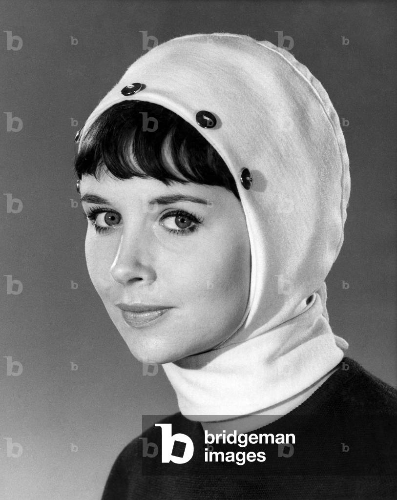 Woman wearing all in one headscarf. Reveille Fashions. Ann Cave. January 1967