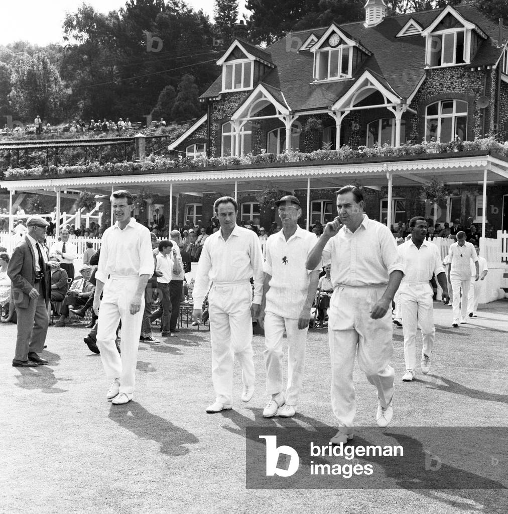 County Championship 1967. Kent v. Warwickshire at Crabble Athletic Ground, Dover. Colin Cowdrey leads out Kent players. 30th August 1967 (b/w photo)