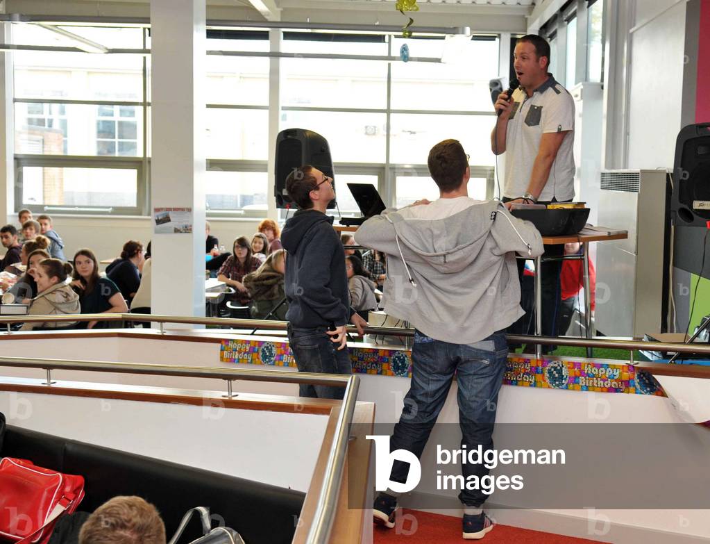 It was the year Britain joined Europe, Sunderland won the FA Cup and Princess Anne married Captain Mark Philips. But in Stockton, 1973 was the year post-16 education was transformed with the opening of Stockton Sixth Form College. And 40 years on, staff and students, past and present, let their hair down with a celebration party, complete with staff in fancy dress and a groovy 1970s disco. Pictured Students run to the DJ with answers to the quiz question, 24/10/2013 (photo)