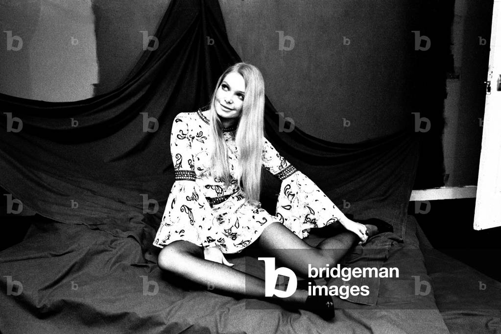 A model wears a dress for a fashion shoot, 13th April 1970 (b/w photo)