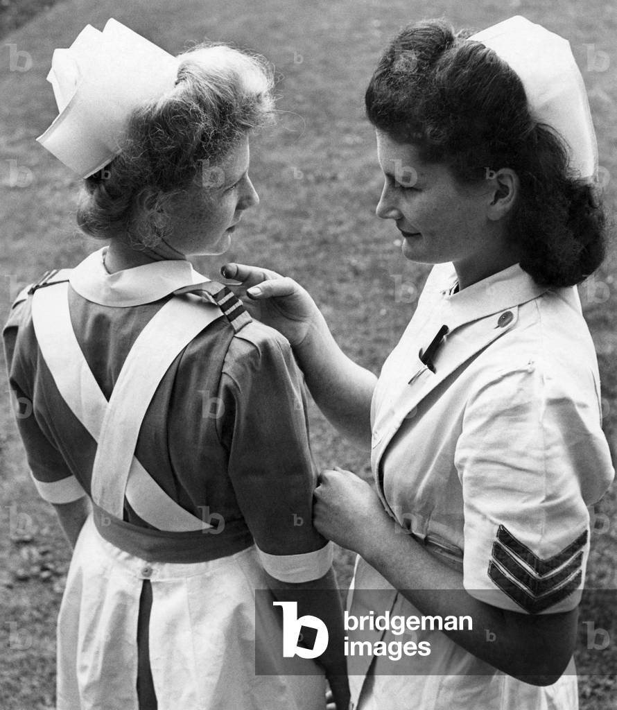 Nurses at Dulwich Hospital had a preview today of uniforms they will wear in the future as soon as their present ones wear out. The uniforms are completely new and may be adopted by every hospital in Britain. May 1949 P018812