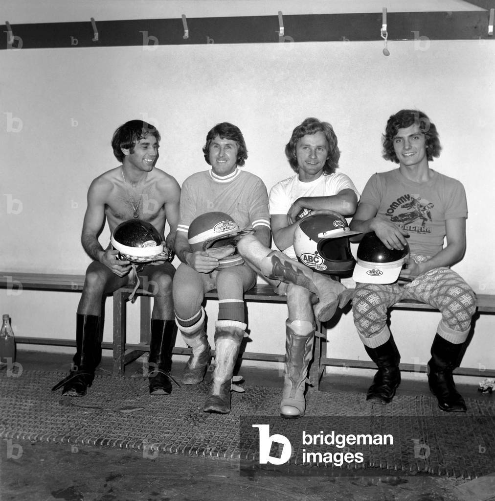 Speedway Riders l-r: Ivan Mauger, Barry Briggs, Scott Autrey (Exeter) and Tommy Jansson (Wimbledon) pictured in the dressing room at Wimbledon Stadium, 17th April 1975 (b/w photo)
