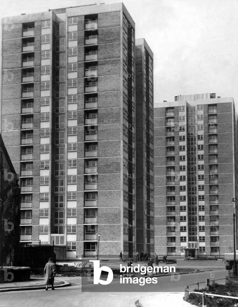 The high rise flats at Cruddas Park Housing Estate in Newcastle 26 June 1962 circa. Workmen and residents go about their daily life