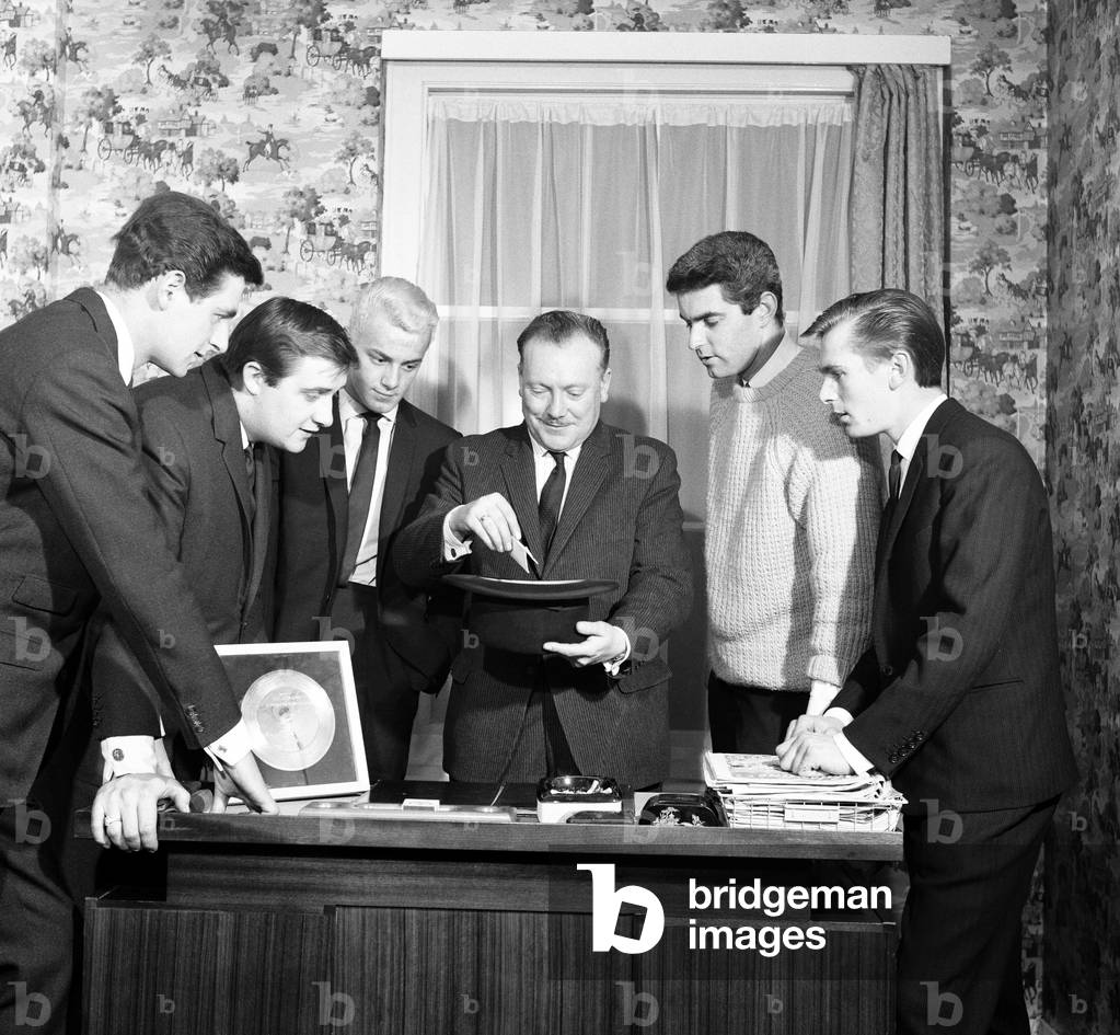 The Tornados, English instrumental group, pictured with Pat Doncaster of the Daily Mirror, Tuesday 2nd February 1963.