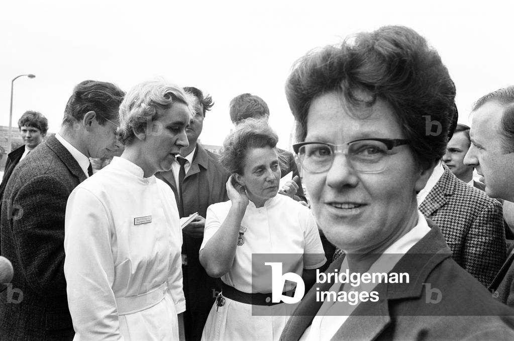Principle Nursing Officer, Mrs Telford, at Birmingham Maternity Hospital, where It was reported earlier yesterday, 2nd October 1968, that Sheila Thorns from Birmingham underwent a Caesarean section early this morning during which six children - four boys and two girls - were delivered., 1968 (b/w photo)