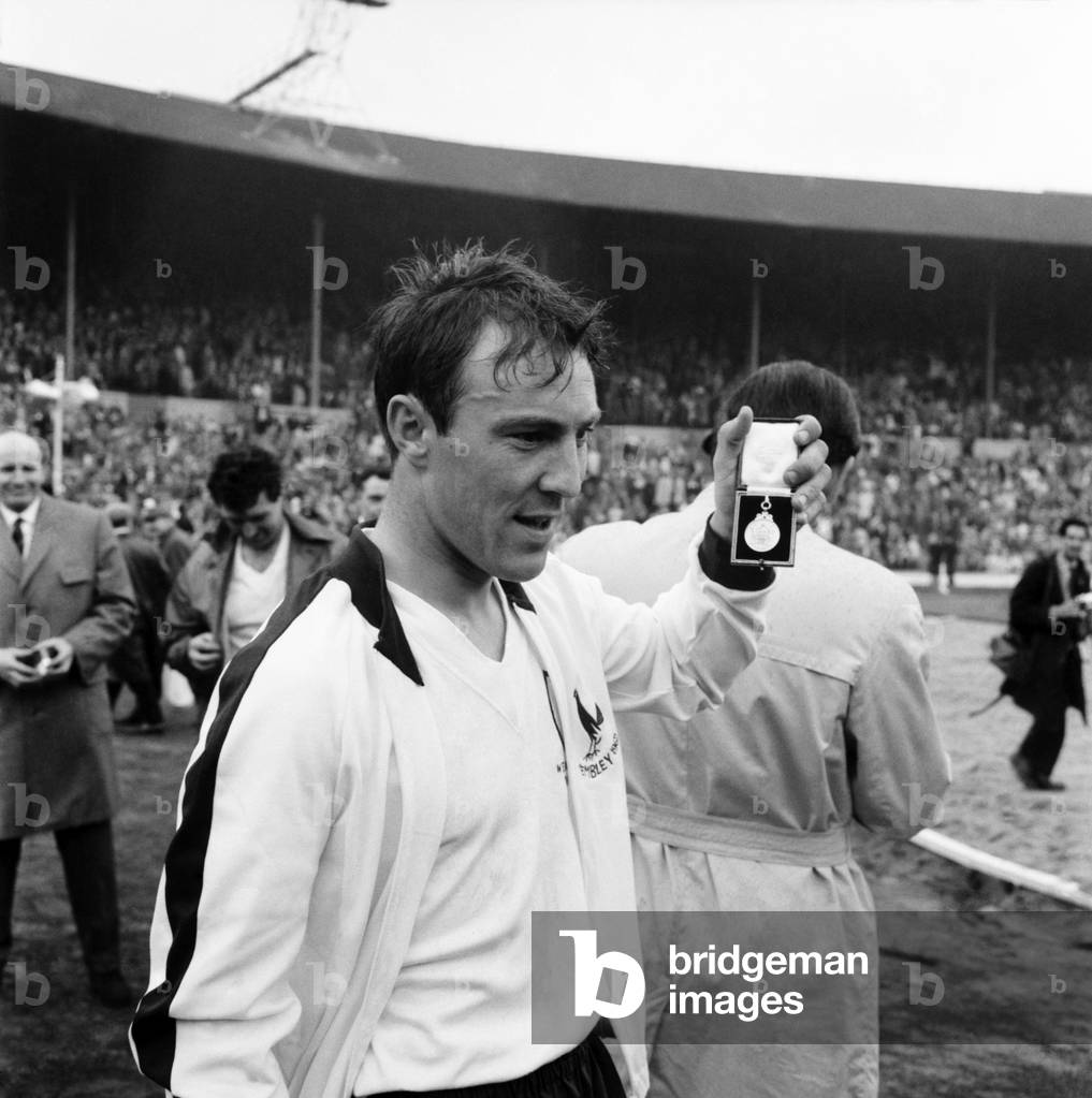 FA Cup final at Wembley Stadium. Tottenham Hotspur 3 v. Burnley 1. Spurs striker Jimmy Greaves shows off his medal after the presentationMay 1962 Q3891A-005 (photo)