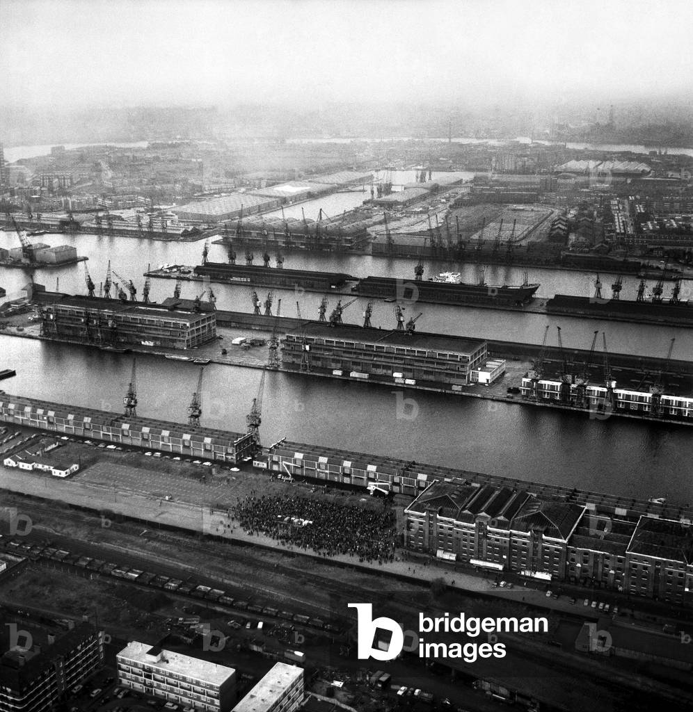 Aerial views of London Docks as dockers vote to end thier five week strike which had crippled the docks, April 1975 (b/w photo)