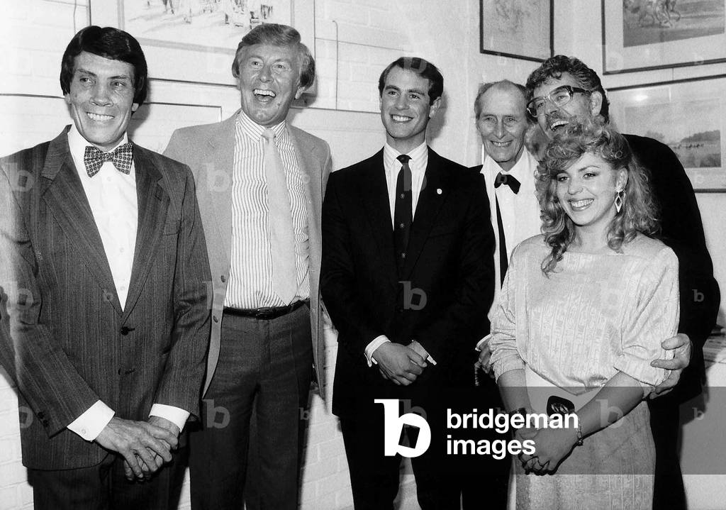 Prince Edward, James Osbourne Artist, Ray Allen Entertainer, Peter Cushing Actor, Rolf Harris and his daughter Bindi Harris at a celebrity art auction in Covent Garden. September 1987
