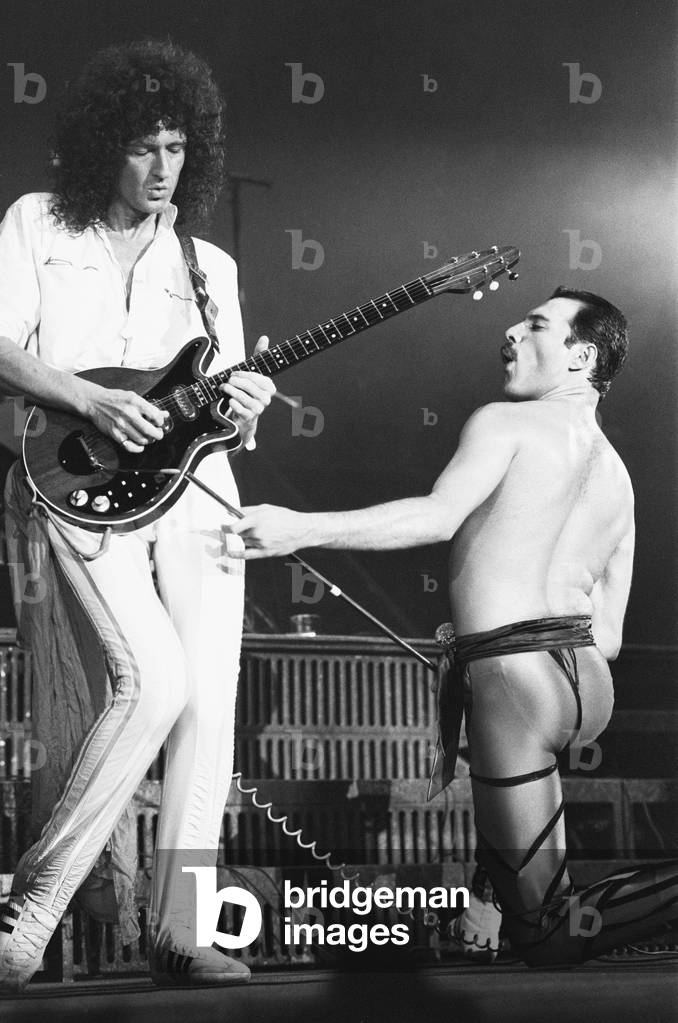 Rock group Queen in concert at Wembley Arena.
Lead singer Freddie Mercury performing on stage on his 38th birthday with guitarist Brian May.
5th September 1984.