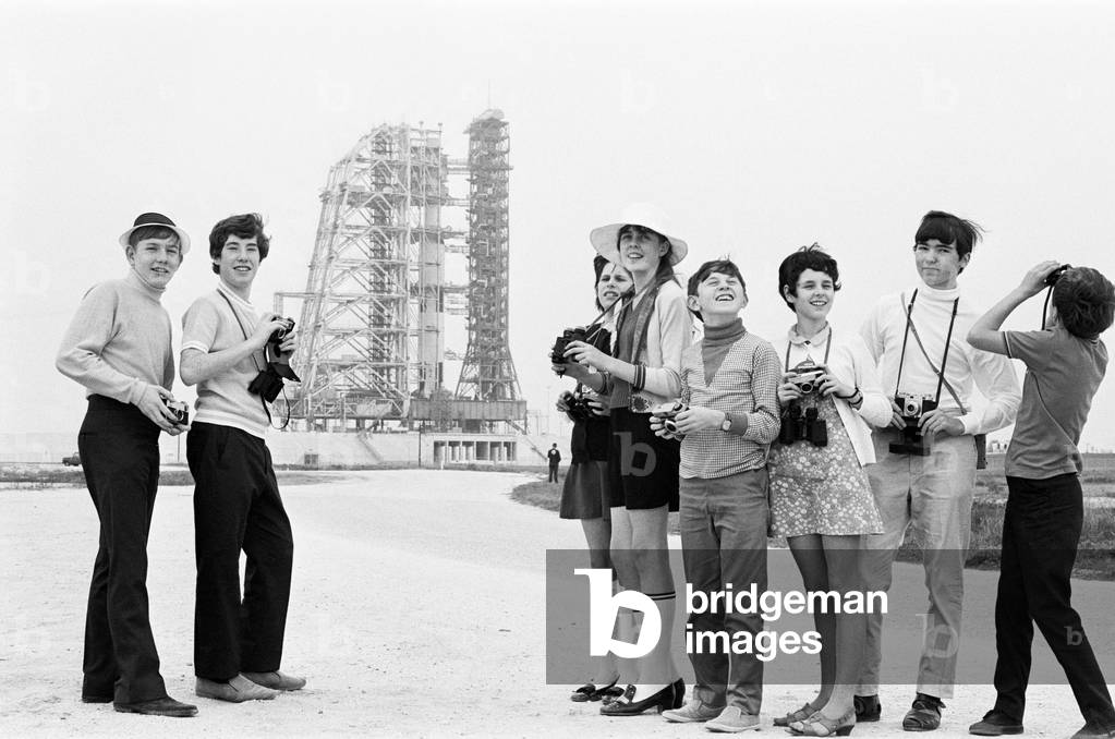 Visitors at NASA Space Station in Florida, U.S.A a few hours before Apollo 12 blasted off on a mission to the moon. Children near the launch pad from where the shuttle will blast off. November 1969 (b/w photo)